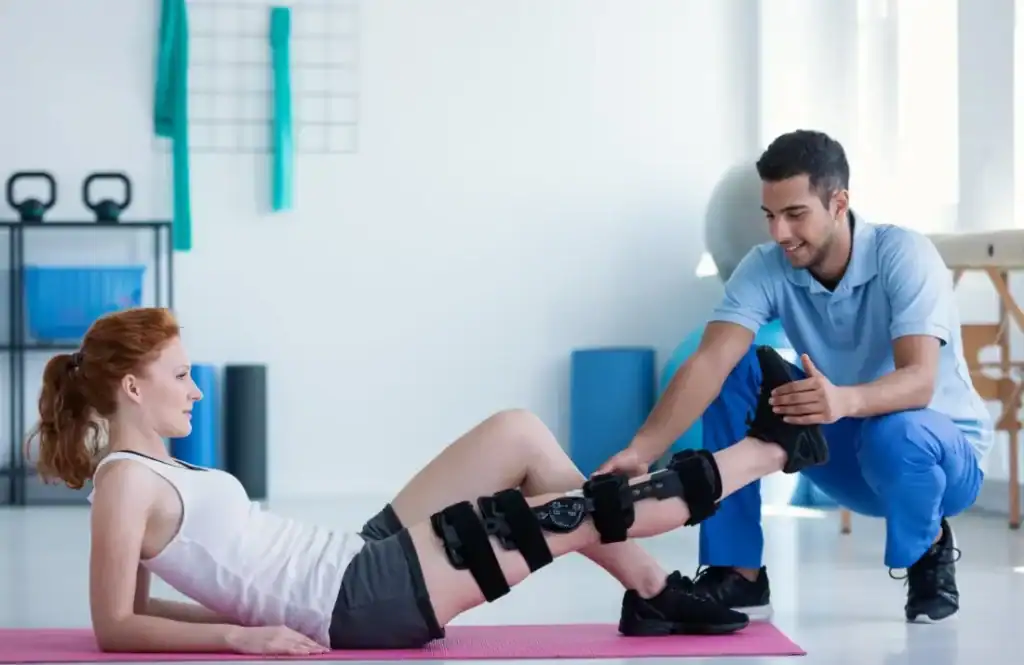 Woman having treatment to help muscle recovery Berkshire after an injury
